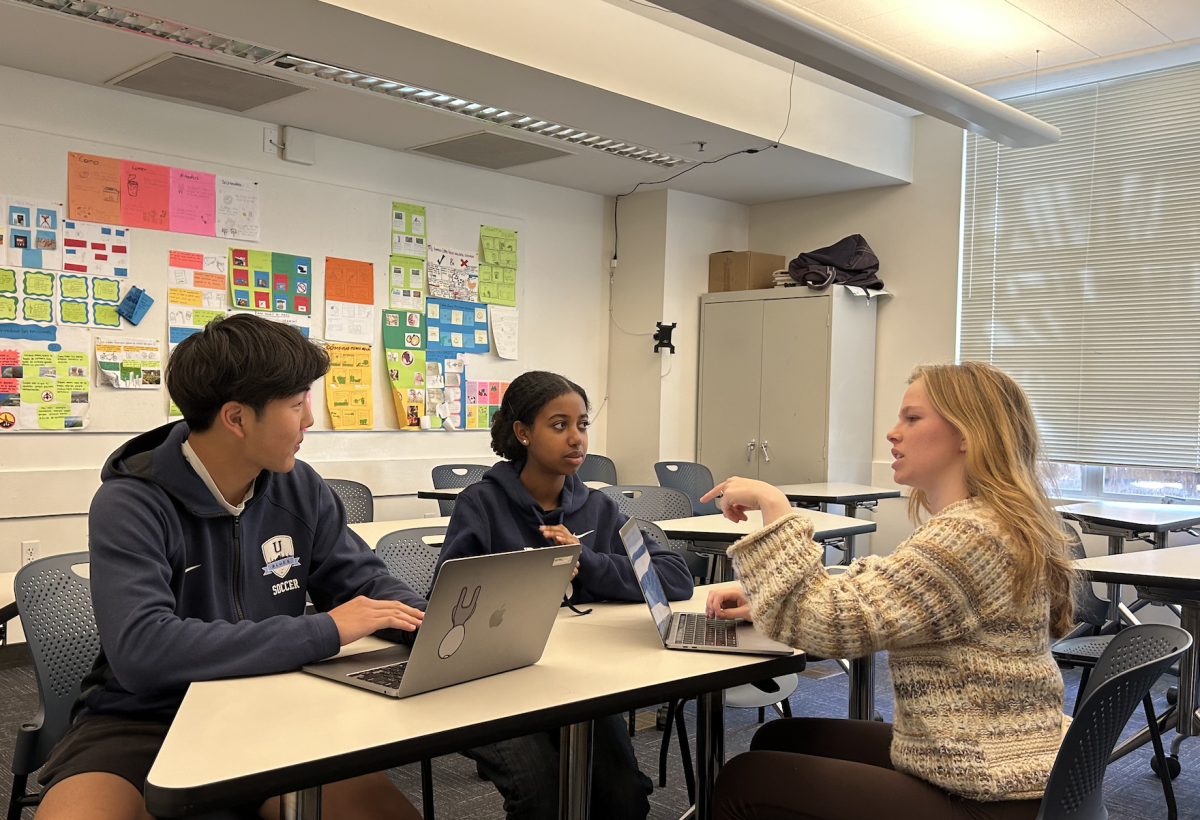 This year's StuCo secretary (Stella Reynaga '24) and co-presidents (Sephora Haileselassie '24 and Alex Yang '24) at an executive team meeting on May 8, 2024. Photo credit: Daphne Yeh Gilman.