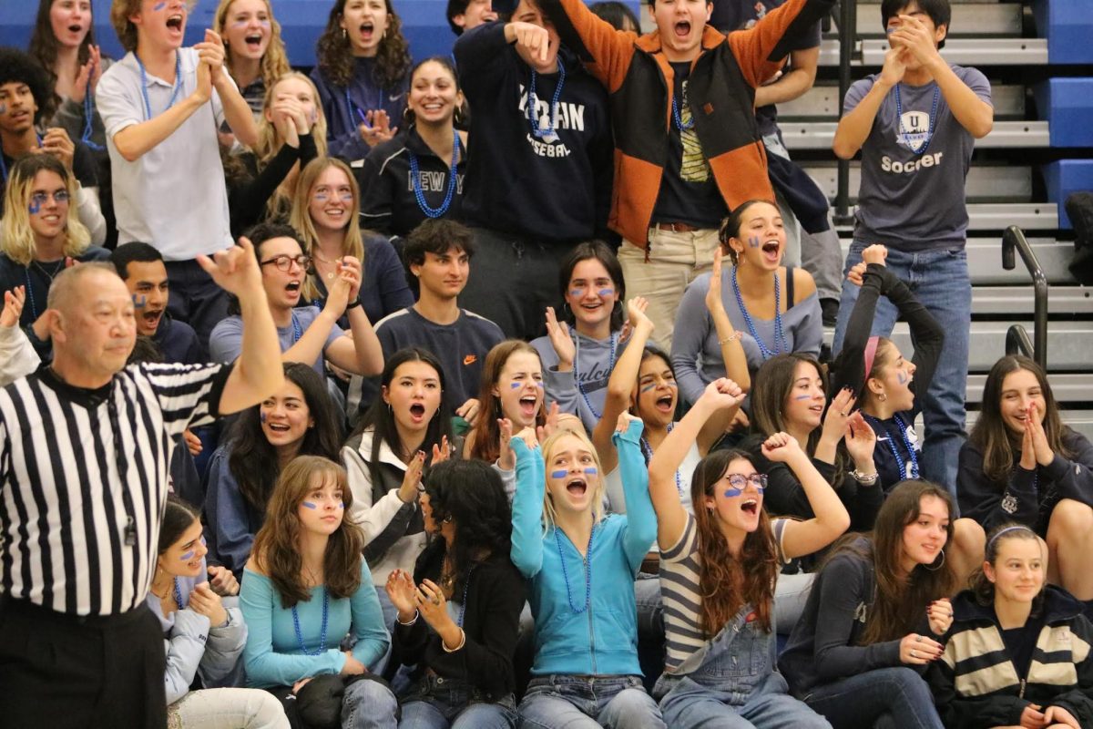 Crowd cheering at a volleyball game against Convent on Dec. 10, 2023. Photo credit: Rizal Adanza.